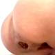A woman takes a firm shit into a toilet with her ass only inches away from the camera lens. She stands up to wipe her ass and shows us her dirty TP. Presented in 720P HD. About 1.5 minutes.